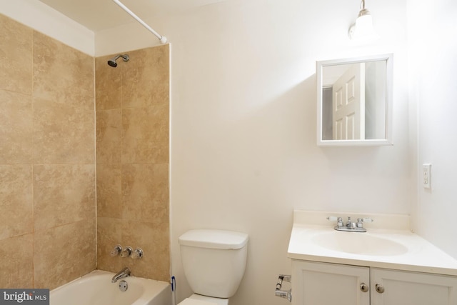 full bathroom featuring shower / washtub combination, vanity, and toilet