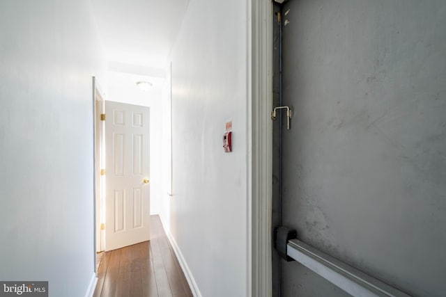 corridor with wood finished floors