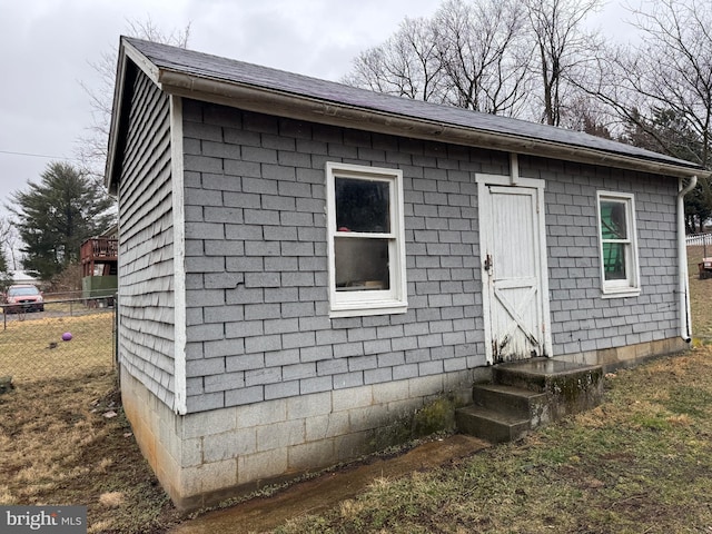 exterior space with entry steps and fence