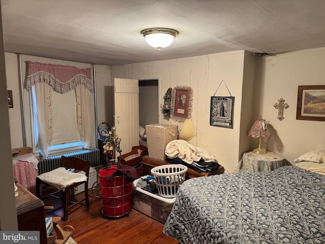 bedroom with wood finished floors