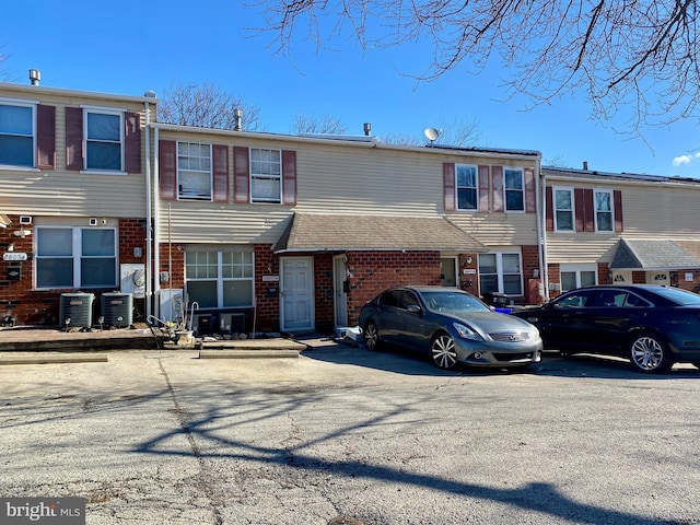 multi unit property featuring brick siding