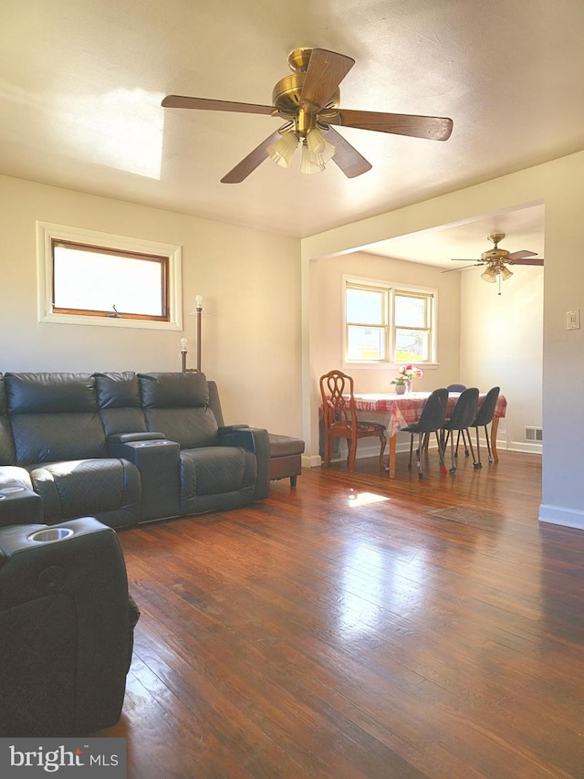 1205 Stratwood Ave, Oxon Hill, MD 20745 - living room featuring visible vents, wood-type flooring, baseboards, and a ceiling fan