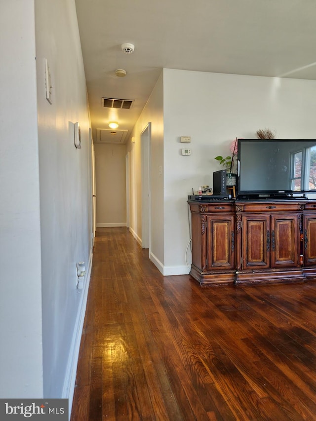 1205 Stratwood Ave, Oxon Hill, MD 20745 - hall with attic access, baseboards, visible vents, and dark wood-type flooring
