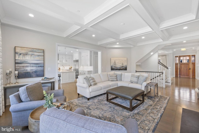 living room with recessed lighting, beamed ceiling, coffered ceiling, and light wood-style floors