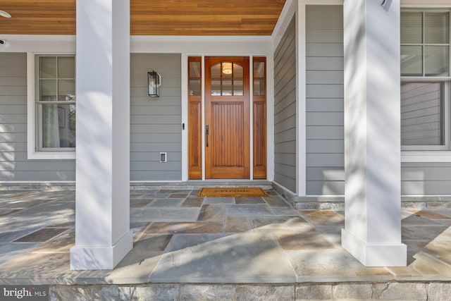 entrance to property with covered porch