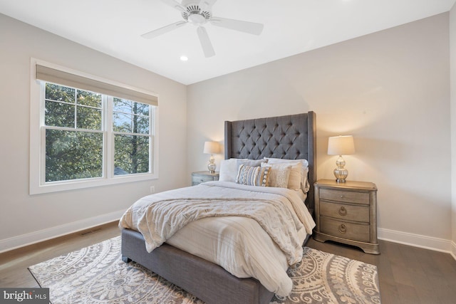 bedroom with ceiling fan, recessed lighting, wood finished floors, visible vents, and baseboards