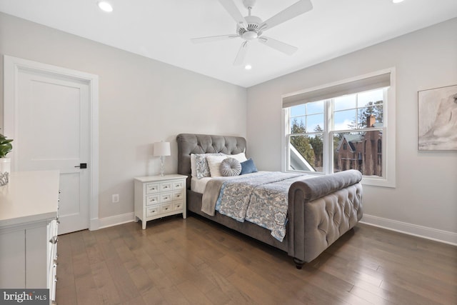 bedroom featuring dark wood-style floors, recessed lighting, and baseboards