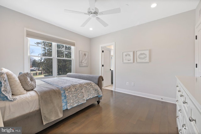 bedroom with baseboards, dark wood finished floors, a ceiling fan, and recessed lighting