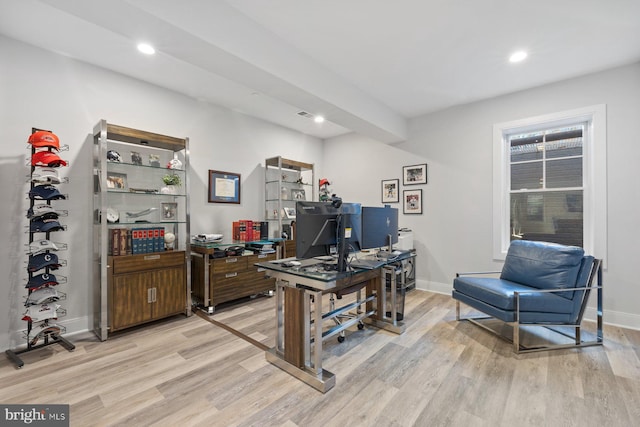 home office featuring light wood finished floors, baseboards, and recessed lighting