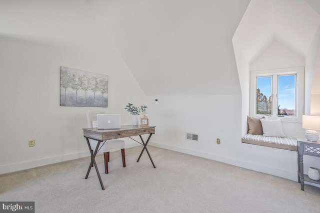 office featuring lofted ceiling, carpet flooring, visible vents, and baseboards