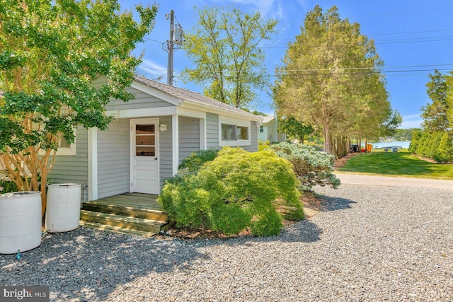 view of front of home with an outdoor structure