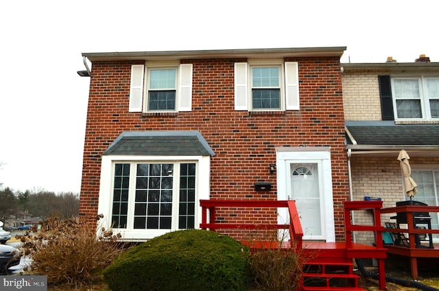 view of front of property featuring brick siding