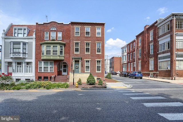 exterior space featuring brick siding