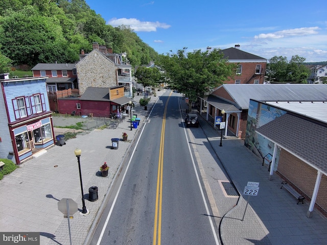 102 Rowland Dr Unit 101, Port Deposit, MD 21904 - view of asphalt road with sidewalks, street lights, and a residential view