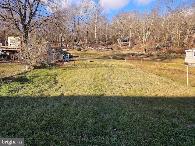 view of yard featuring fence