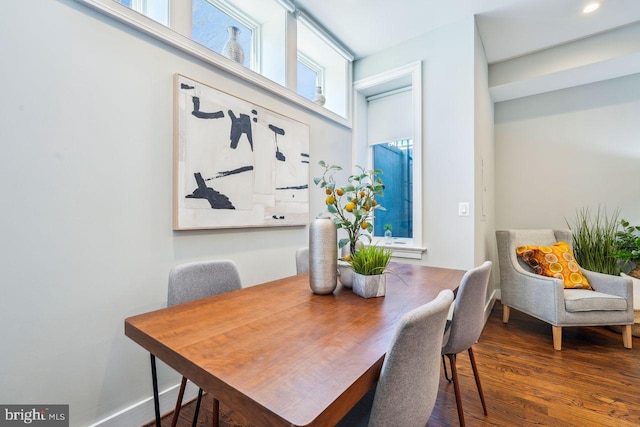 dining room with wood finished floors