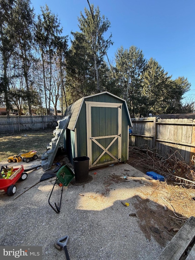 view of shed featuring a fenced backyard