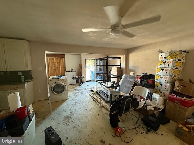 interior space with washer / dryer and a ceiling fan