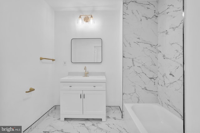 full bathroom with marble finish floor, vanity, and shower / bathtub combination