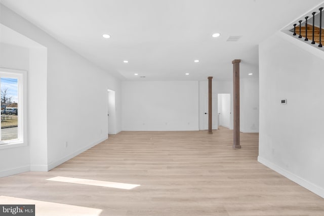 interior space featuring stairway, recessed lighting, light wood-style floors, and baseboards