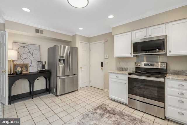 kitchen featuring crown molding, stainless steel appliances, visible vents, white cabinetry, and light tile patterned flooring