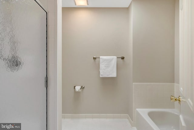 bathroom featuring a garden tub