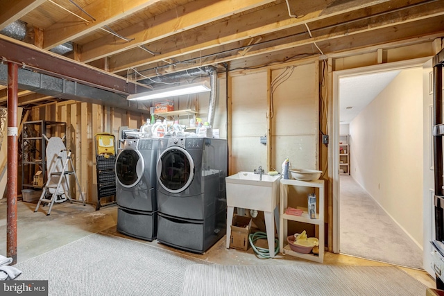 laundry room featuring laundry area and separate washer and dryer