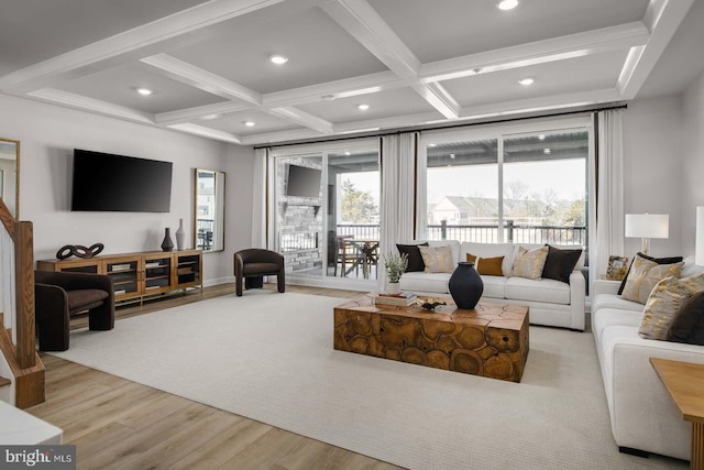 living room with recessed lighting, coffered ceiling, beamed ceiling, and wood finished floors