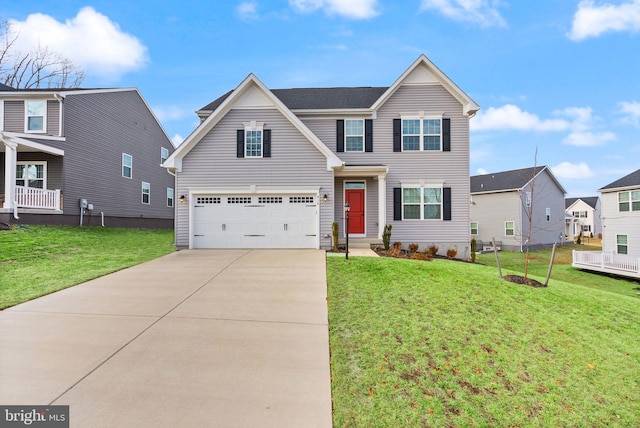 traditional-style house with an attached garage, a front lawn, and concrete driveway