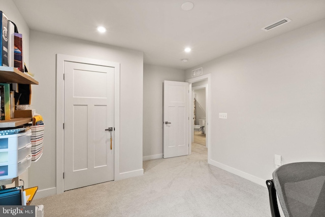 interior space featuring recessed lighting, baseboards, visible vents, and carpet flooring