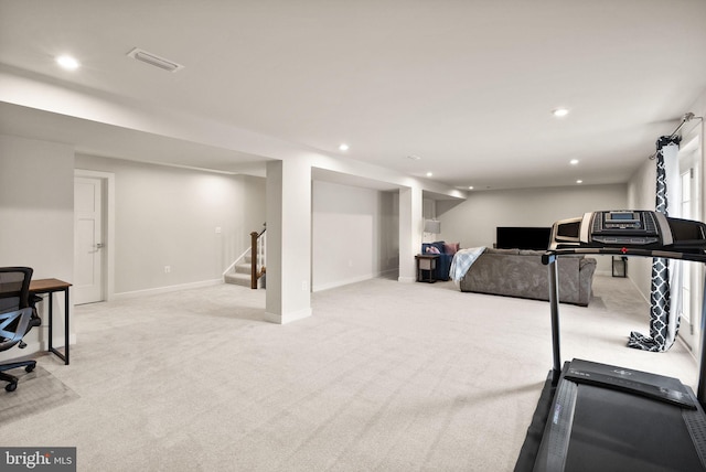 exercise room with baseboards, recessed lighting, visible vents, and light colored carpet