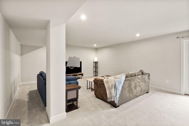 living room featuring baseboards, visible vents, carpet flooring, and recessed lighting