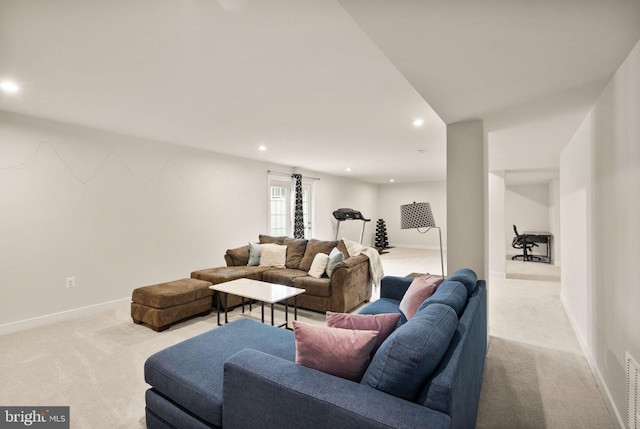 living area featuring light carpet, visible vents, baseboards, and recessed lighting