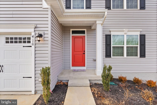 entrance to property featuring a garage