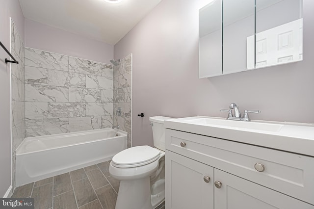 bathroom with shower / washtub combination, wood tiled floor, vanity, and toilet