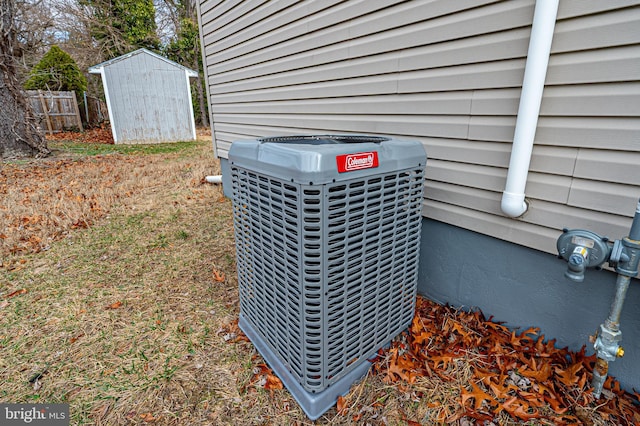 exterior details featuring central air condition unit and fence