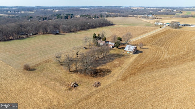 birds eye view of property featuring a rural view