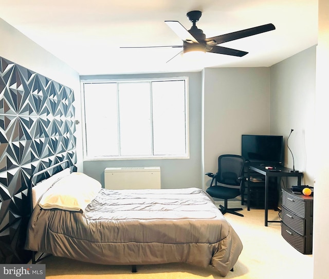 bedroom with ceiling fan and carpet floors