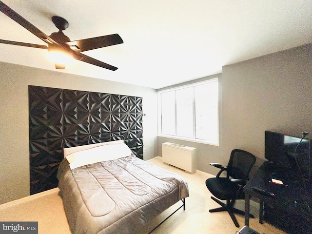 bedroom with carpet floors, a ceiling fan, and baseboards