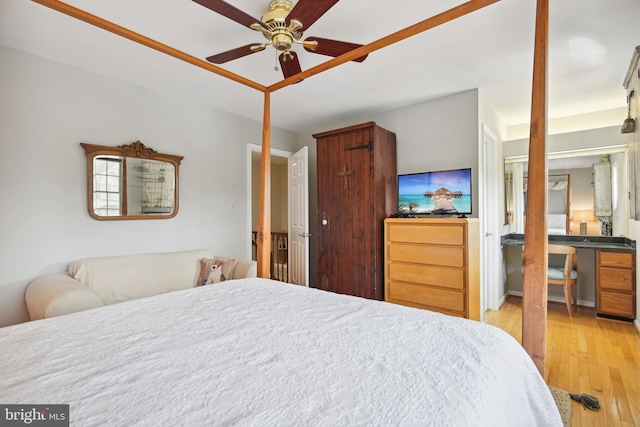 bedroom with a ceiling fan and light wood finished floors