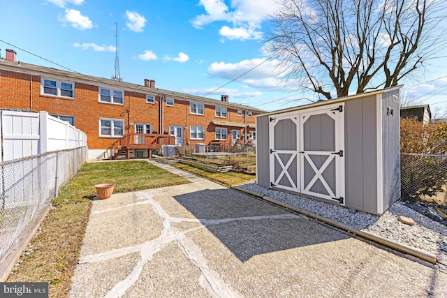 exterior space featuring a fenced backyard