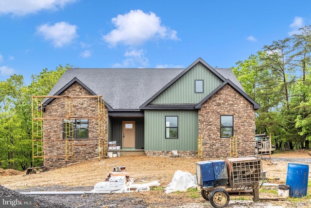 103 Husk Trl, Berkeley Springs, WV 25411 - view of front facade with stone siding, roof with shingles, and board and batten siding