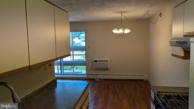 kitchen with a chandelier, a textured ceiling, dark wood-type flooring, white cabinets, and baseboard heating