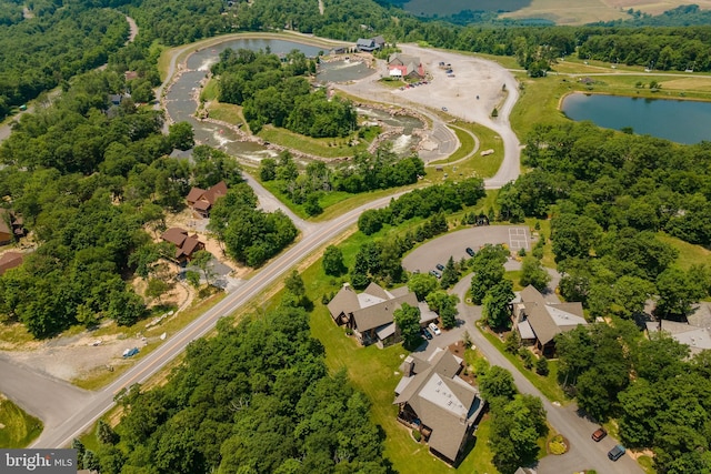 birds eye view of property with a residential view and a water view