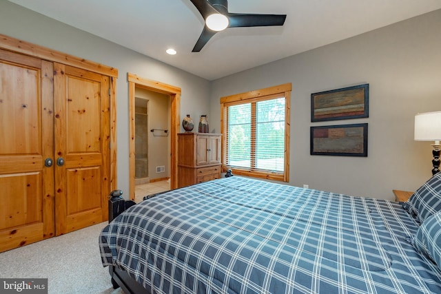 carpeted bedroom featuring recessed lighting, visible vents, and a ceiling fan