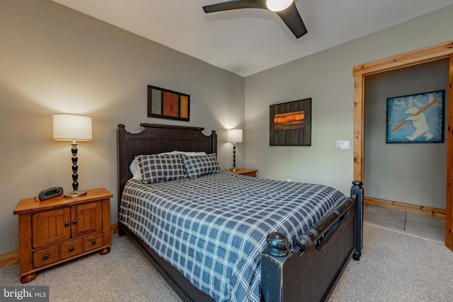 bedroom with baseboards, a ceiling fan, and carpet floors