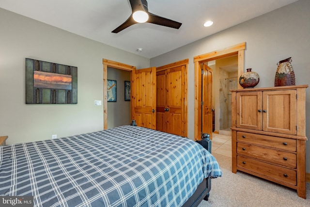 bedroom with a closet, recessed lighting, light colored carpet, and ceiling fan