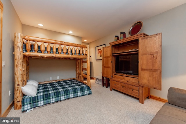 bedroom with recessed lighting, baseboards, and carpet floors