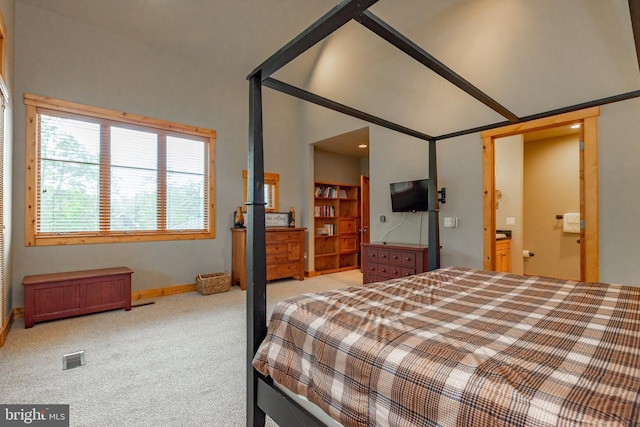 bedroom with light colored carpet