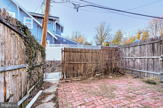 view of patio / terrace with a gate and a fenced backyard